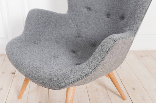 Gray armchair in the interior - Фото, изображение
