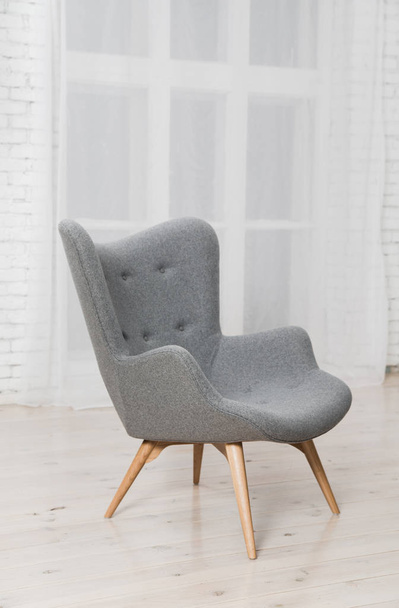 Gray armchair in the interior - Φωτογραφία, εικόνα