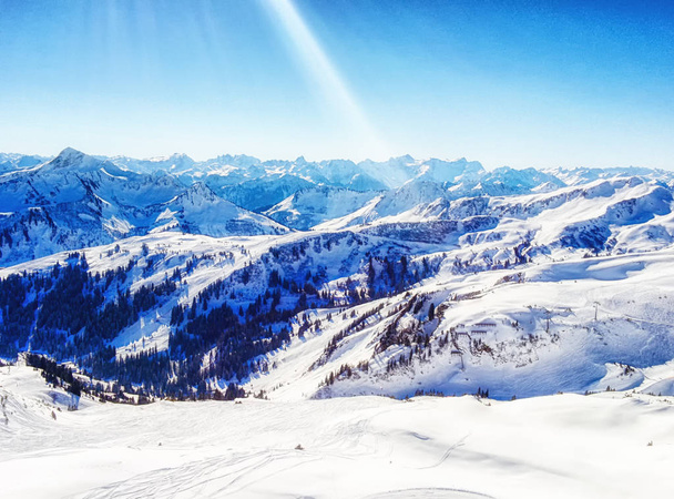 Sunny winter day in alpine ski resort - Photo, Image