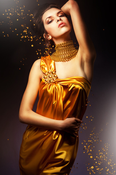 sensual woman in long yellow dress - Фото, зображення