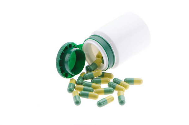 pílulas em fundo branco - Foto, Imagem