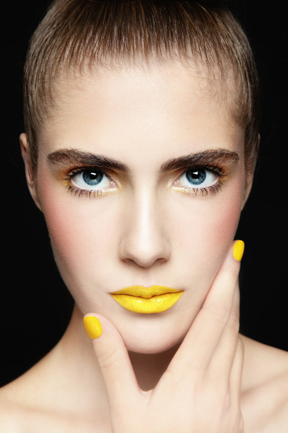 Yellow lipstick - Фото, изображение