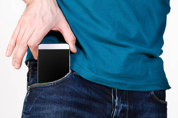 Mobile phone in a pocket - Fotografie, Obrázek
