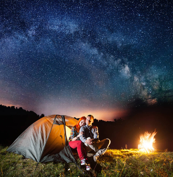 Night camping. Romantic couple  - Photo, Image