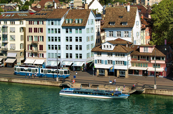 Tram and ferry boat at Limmatquai in city center Zurich - Photo, Image