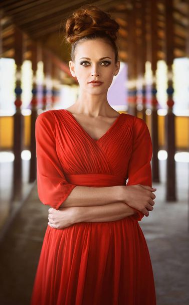 Fashionable beautiful woman in red dress - Foto, imagen