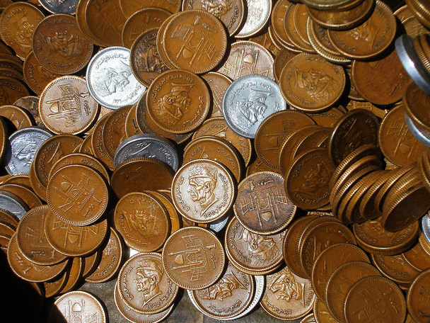 Moneda paquistaní - Monedas de una rupia
 - Foto, Imagen