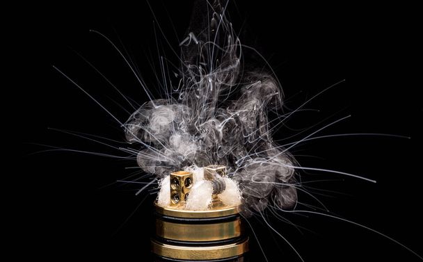  Burning of Electronic cigarette. Popular vaporizing e-cig gadge - Fotografie, Obrázek