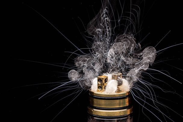  Burning of Electronic cigarette. Popular vaporizing e-cig gadge - Photo, Image