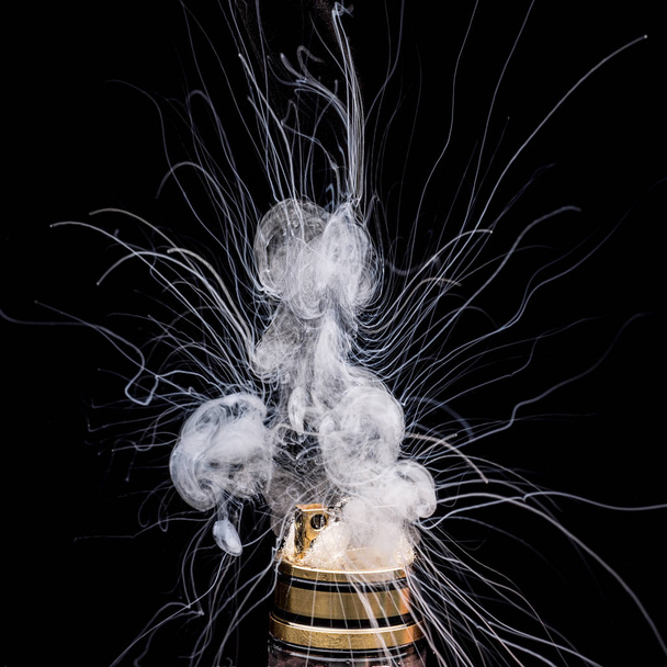  Burning of Electronic cigarette. Popular vaporizing e-cig gadge - Photo, Image