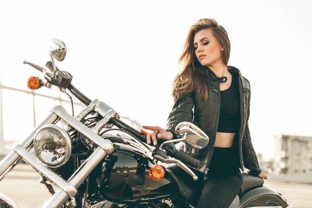 Girl on a motorcycle - Фото, изображение
