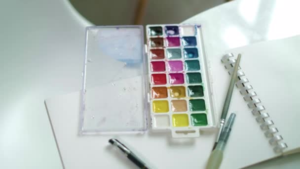 Woman artist painting watercolor paints 4k - Metraje, vídeo