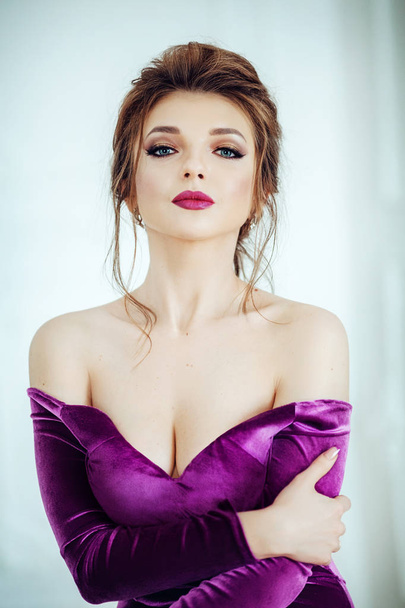 Beautiful  young  woman in velvet dress - Foto, imagen