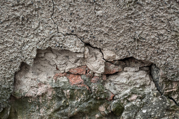 Rock texture and surface background. Cracked and weathered natural stone background. The wall of the ruined house - Foto, imagen