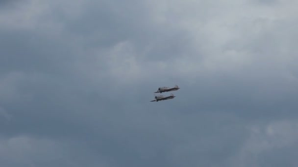 Military plane flies in the sky - Felvétel, videó