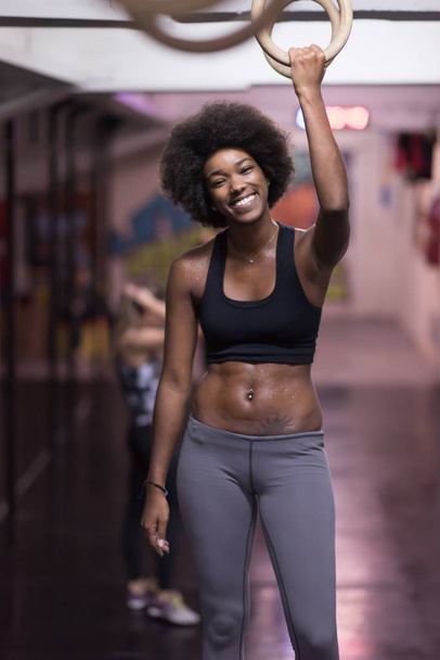 black woman doing dipping exercise - Valokuva, kuva