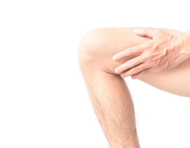 Крупный план человек рука держать колено с симптомом боли, здравоохранения и медицины концепции
 - Фото, изображение