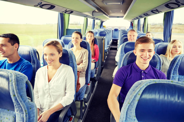 group of happy passengers in travel bus - Zdjęcie, obraz