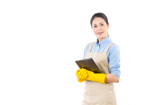Housewife holding digital tablet search services - Photo, image