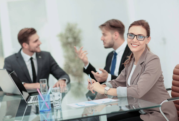 Beautiful modern businesswoman  working with  her colleagues on - Fotoğraf, Görsel