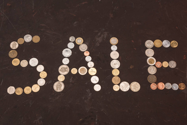 sale sign made of coins  - Photo, Image