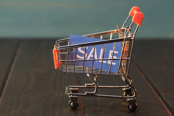 small shopping cart with sale sign - Photo, Image