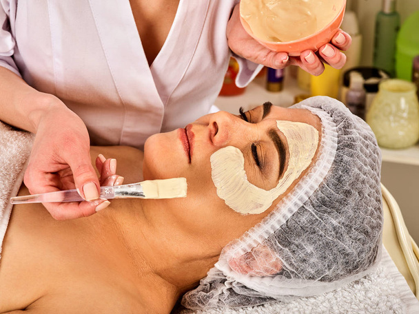 Collagen face mask . Facial skin treatment. Woman receiving cosmetic procedure. - Photo, Image