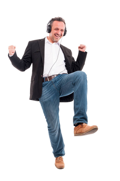 Happy man listening music and dancing - Фото, зображення