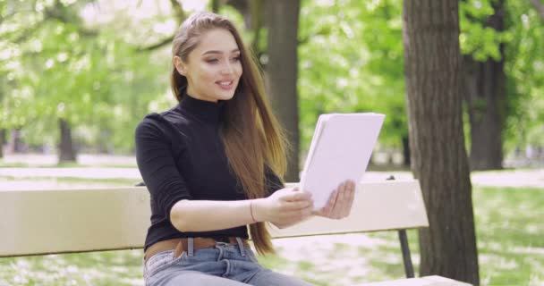 Smiling woman using tablet - Footage, Video