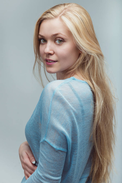 Portrait of a beautiful young blond woman - Fotó, kép