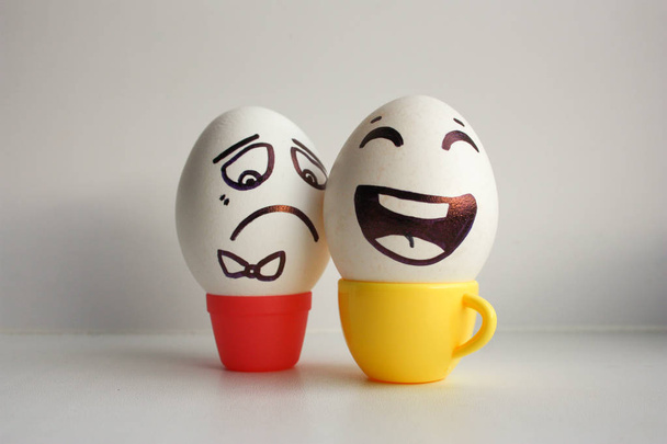 Eggs face. Cheerful breakfast company. Photo for your design - Foto, afbeelding
