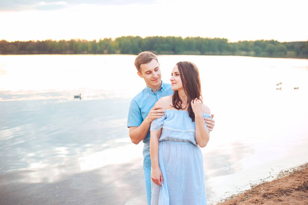 Close up romantic beauty portrait of happy couple in love hugs and having fun, evening sunlight, - Photo, Image