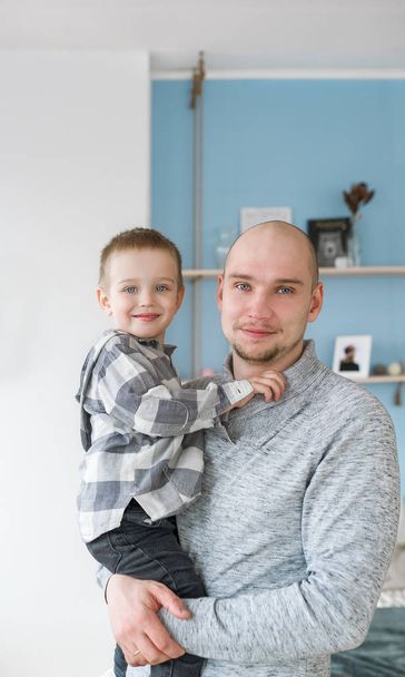 Portrait of the young father and his little son. - Fotoğraf, Görsel