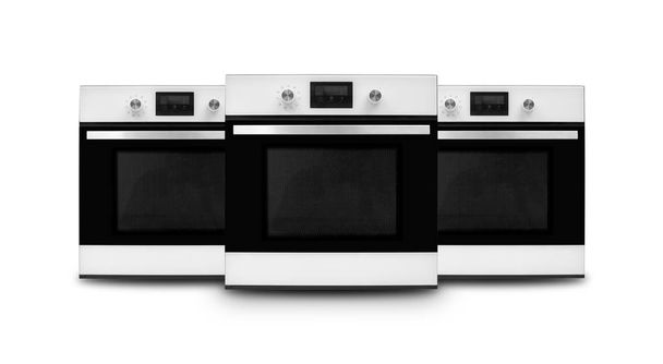 Household appliances. Three Oven. Isolated - Photo, Image