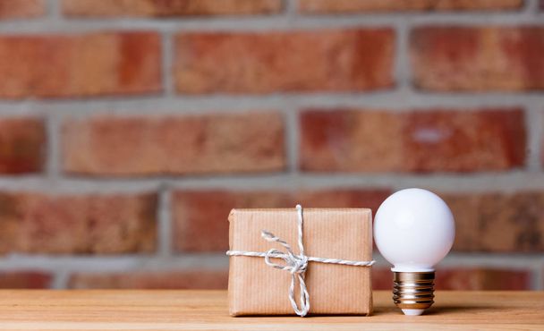 light bulb and gift box - Photo, Image