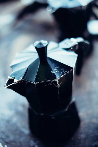 Black metallic coffee maker on stone table background - Photo, image