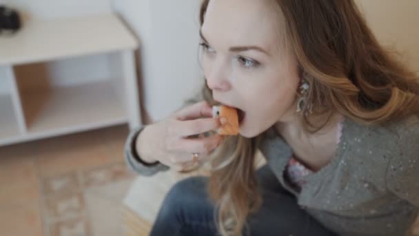 Woman with eats sushi. Lady tasting sushi rolls. Better than I expected. Excellent taste of japanese food. - Záběry, video