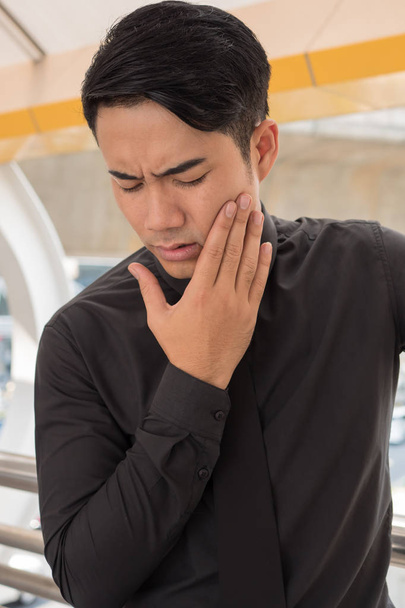 man suffering from toothache, oral problem - Photo, Image