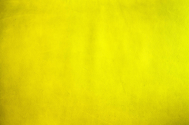 Nahaufnahme auf altem gelben Leder und Textur Hintergrund, gelbe Farbe leere Oberfläche Hintergrund mit Platz für Text, Zeichen und Luxus-Stil-Design - Foto, Bild