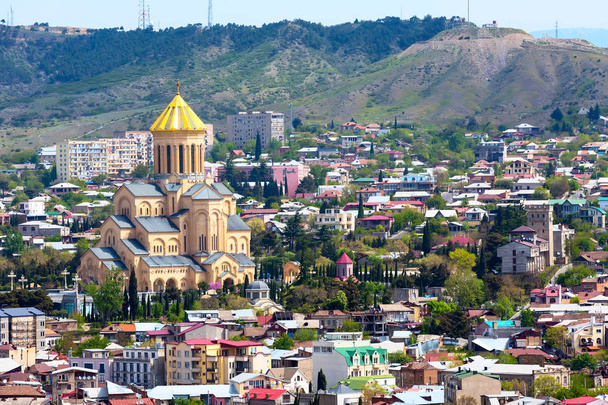 Tbilisi, Georgia aerial skyline view with old traditional houses and church - Foto, Bild