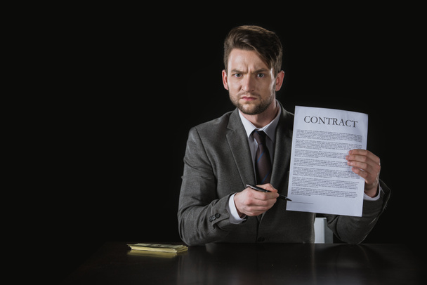 businessman in suit with contract - Photo, image