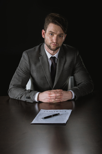 businessman in suit with contract - Photo, image