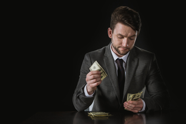 businessman counting money - Foto, afbeelding