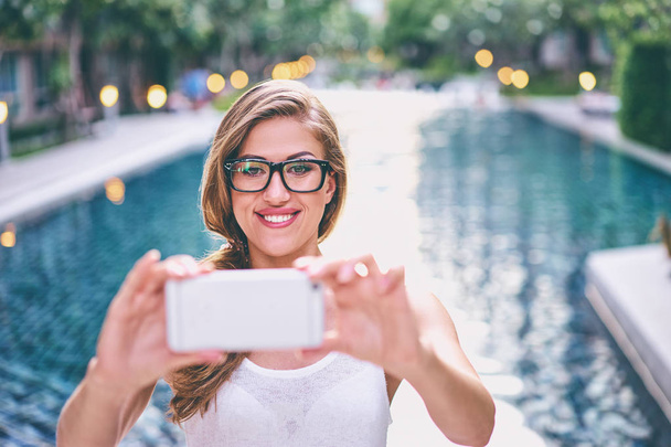 Young woman taking selfie  - Fotó, kép