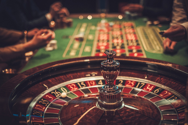 Gambling table in luxury casino - Foto, afbeelding