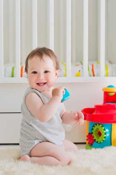 baby playing with educational toy in nursery - Photo, Image