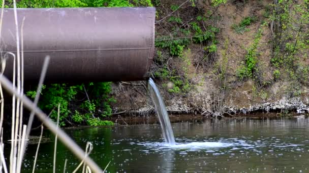 The flow of water spilling from the pipe - Footage, Video