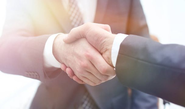 Business people shaking hands after good deal - Fotó, kép