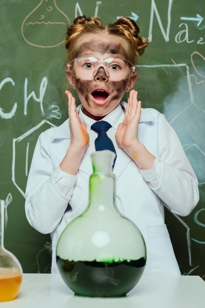girl in lab coat with flask - Photo, Image