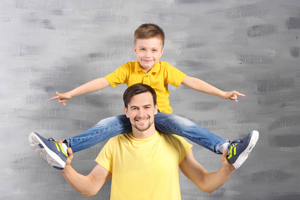 Handsome man and son  - Foto, afbeelding